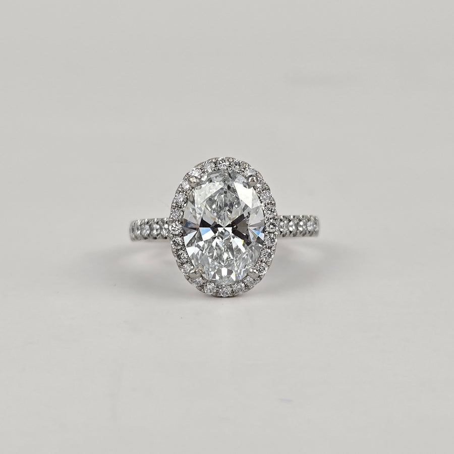 Platinum 2ct D VVS2 Lab Diamond Oval Ring with Lab Diamond Side and Halo Stones
