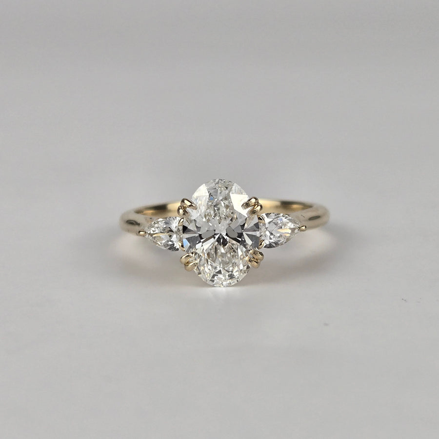 Solid 14k Gold 1.5ct F VS1 Oval Lab Diamond Ring with Lab Pear Diamond Side Stone and Lab Diamond Hidden Bridge (OV858)