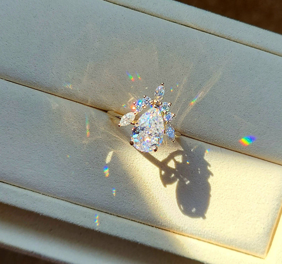 solid 14k gold 4ct 8x12mm pear moissanite ring with side moissanite