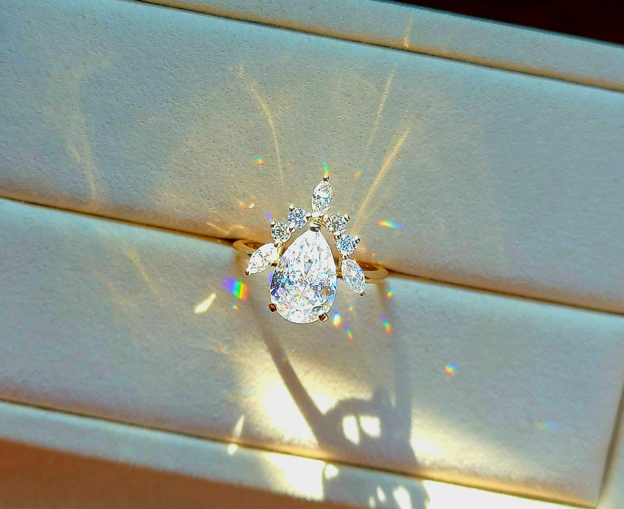 solid 14k gold 4ct 8x12mm pear moissanite ring with side moissanite