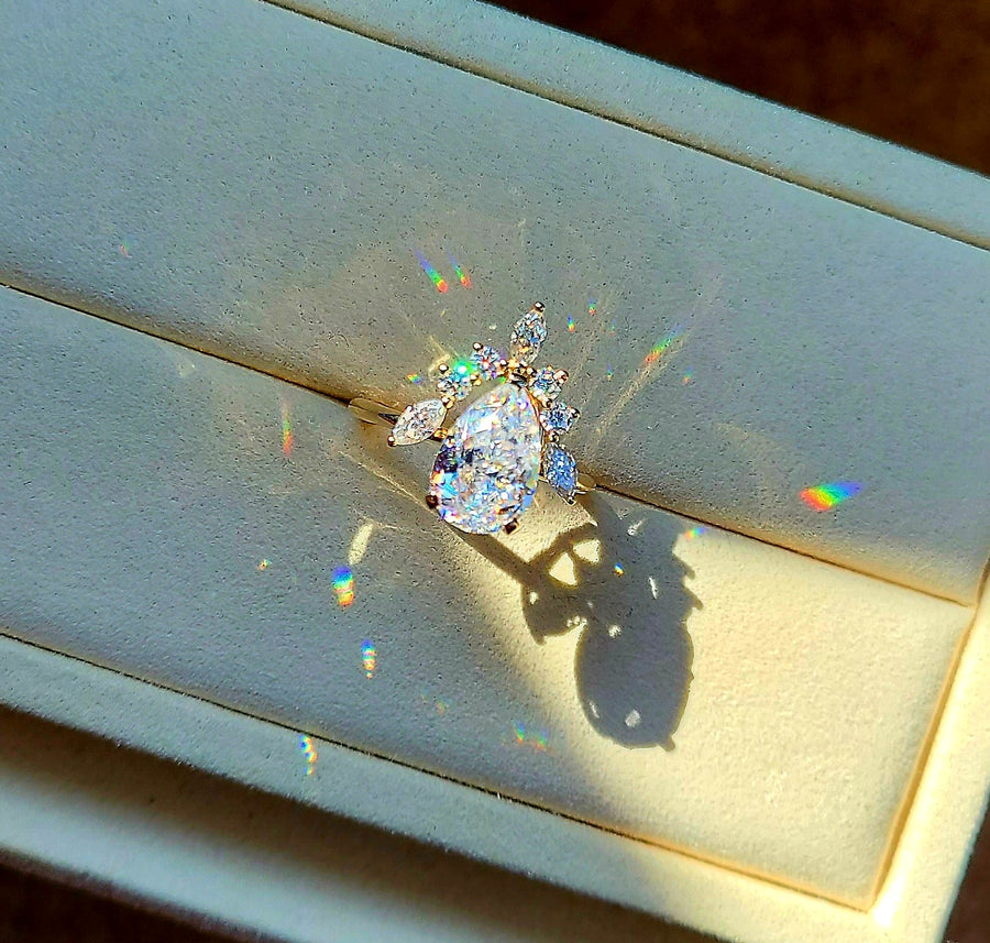 solid 14k gold 4ct 8x12mm pear moissanite ring with side moissanite