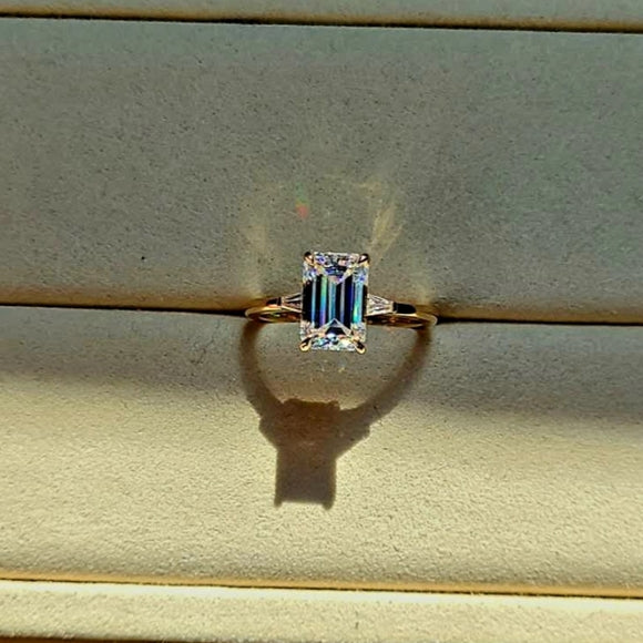 solid 14k gold 2.5ct emerald cut moissanite ring with side moissanite