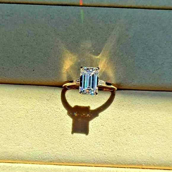 solid 14k gold 2.5ct emerald cut moissanite ring with side moissanite